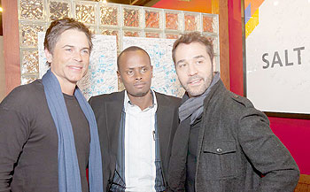 Ishmail Ntihabose (C) with 'Entourage Stars' Rob Lowe (L) and Jeremy Piven during the 2011 Sundance Film Festival.