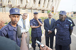  Altruistic police officer, Frank Bizimungu (L) tells the story of how he picked USD 40,000 and helped return it to the owner.The New Times /John Mbanda.