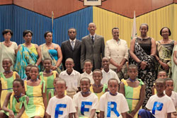 President Kagame and the First Ladies of Rwanda and Uganda, in a group photo with the House leaders, members of the Rwanda Women Parliament Forum and young children during the event to celebrate 15th anniversary of the Forum in Parliament, yesterday. Th