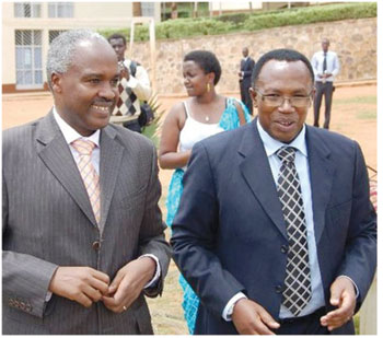 Former minister of education , mr. Muligande charles and headmaster of lycee de kigali masabo m. Martin (r).