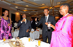Presidents Paul Kagame and Yoweri Museveni together with the First Ladies at Kigali Serena Hotel, last Sunday.