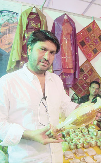 Fodhil Mohammed the 2011 Expo Exibitor from Pakistan. The NewTimes/ D.Umutesi