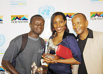 (R-L) Eric Kabera, Cleophas Kabasita and Jean Baptiste Minani  pose with their awards. The New Times/A. Ndungutse.