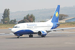 A RwandAir plane on a Kigali International Airport runway. Then New TImes/ Courtesy 