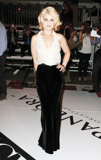 Kelly Osbourne in white ruffle top