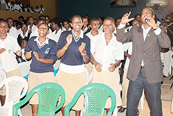 Kizito Mihigo performing at Lycu00e9e de Kigali. The New Times / file