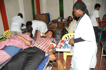 An Indian couple living in Rwanda donating blood on Saturday. The New Times /file.