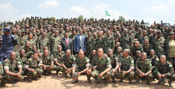  Local Government Minister, Musoni James poses for a group photo with the Executive Secretaries undergoing civic education yesterday. The New Times / B. Mukombozi