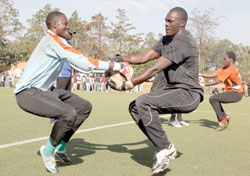SAFE HANDS: Jean Luc Ndayishimiye (L), seen here in training with teammates before the last qualifier against Burundi. The New Times/ File