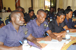  Police officers take notes during a training worshop in the past. The New Times /File.