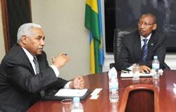 World Bank Executive Director Hassan Ahmed Taha (L) with Finance Minister John Rwangombwa at the latter's offices yesterday. The New Times /John Mbanda.