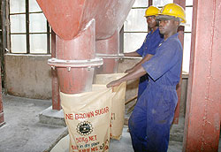 Workers at Kabuye Sugar factory. Government has moved to contain the surging sugar prices. The New Times File.