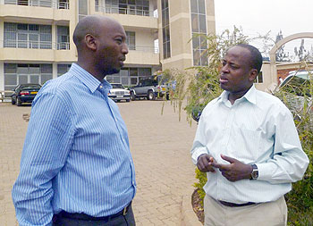  Dr. Christian Ntizimira, Director of Kibagabaga Hospital talking to Dr. Aflodis Kagaba the Executive Director of HDI after opening the training NewTimes/Courtesy 