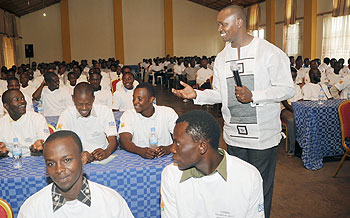 PSF Director of Employment Antoine Manzi speaks to graduates under the internship program yesterday. The New Times John Mbanda.