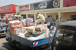 Trucks offloading merchandise on Matheus street, Kigali.The new directive is to have them start offload merchandise from 9pm in the evening. The New Times File.
