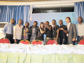 PGGSS organising team and the artistes pose for a photo during the event. The New Times /M. Linda