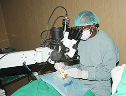  Dr. John Nkurikiye performs a cornea transplant operation . The New Times /John Mbanda