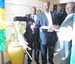  (L-R)  RRA boss Ben Kagarama, Francois Rutayisire(C), and Roger Munyapenda of PSF during the launch of the RRA call centre yesterday. NewTimes/Courtesy photo