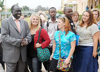  Justice Minister Tharcise Karugarama (L) with the students from Global Youth Connect yesterday. The New Times John Mbanda.
