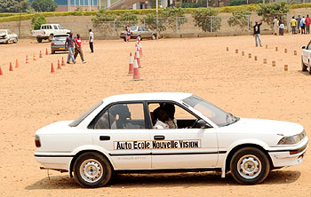  Learners undergo practical driving lessons near the Amahoro National Stadium; The traffic police has introduced an e-registration system  for driving tests. The New Times/ File Photo.