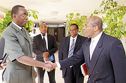  Premier Makuza (L) bids farewell to Jean Philippe Prosper (R), the IFC  Director of East and Southern Africa  after their meeting yesterday. The New Times /John Mbanda