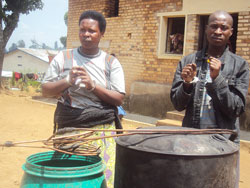 Netted- Claudine Niyotwagira (left) and her accomplice Etienne Kagabo at Nyamabuye police station, photo New Times /Daniel Sabiiti
