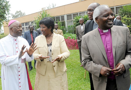 Health Minister, Dr. Agnes Binagwaho (2Left) , with religious heads; Archbishops Thaddee Ntihinyurwa and Onesphore Rwaje, during the fifth annual general assembly of Rwanda Interfaith Network against HIV/AIDS yesterday. The New Times/John Mbanda