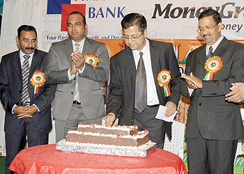 The Chairman of the Indian Community Association of Rwanda Dinesh Kalyan (2right) cuts a cake as he led the Indian community to mark Indiau2019s 65th Independence Day on Monday. The New Times/John Mbanda