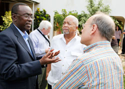 Prime Minister Bernard Makuza chats with US Congressmen after meeting with the CARE delegation in Kigali, yesterday (The New Times /T.Kisambira)