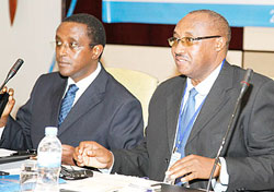 Senate President Dr Vincent Biruta (L) and Cabinet Affairs Minister Protais Musoni  at the opening of the media and gender conference yesterday. The New Times /Timothy Kisambira.