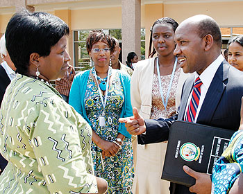 (L-R) Health Minister Dr. Agnes Binagwah, Karusa Kiragu of UNAIDS, Dr. Anita Asiimwe of RBC and Dr. Boureima Hama Sambo of WHO at a meeting to discuss ways of promoting male involvement in elimination Mother to Child Transmission of HIV. The New Times/ T.
