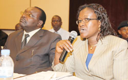 Trade and Industry Minister Francois Kanimba and Monique Mukaruliza, the Minister in charge of East African Community affairs during a meeting. 