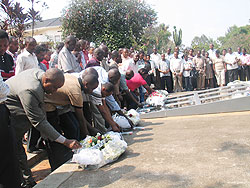 The police officers laying wreaths at the Kigali Genocide Memorial centre. Courtesy Photo