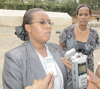  PS Imberakuri President Christine Mukabunani speaks to reporters as Sarah Baweya from NURC looks on, after their meeting yesterday. The New Times John Mbanda.