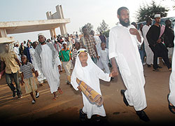 Muslims walk along the Islamic Cultural centre in the Kigali suburb of Nyamirambo for Idi prayers last year. The New Times/ File photo