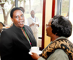  Dr Daphrose Gahakwa deputy director in charge of research at RAB (L) chats with Dr Susan Ikerra (R) the principal Agricultural officer from Tanzania. The New Times Timothy Kisambira