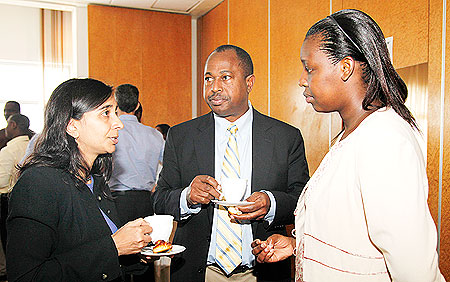 Pratima Raghunathan, the Country Director of CDC (L), Denis Tindyebwa, a Tanzanian expert in Pediatrics and HIV treatment of children, and Dr. Anita Asiimwe, from the Rwanda Biomedical Centre during the meeting yesterday. The New Times /Timothy Kisambira.
