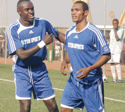 GOOD TIMES: Labama Bokota (right) celebtates with team mate Bonaventure Hategekimana (L) after scoring during the 2008 Peace Cup semifinal against Atraco. The New Times / File