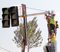 The new state-of-the art traffic lights under installation at a Kigali junction.  The New Times /Timothy Kisambira.