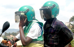  A new disposible material will be inserted inside helmets to protect taxi moto passengers from contracting disease. The New Times /Timothy Kisambira.