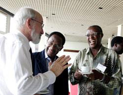 (L-R) Dr Dennis Garrity president of ICRAF, Jeremias G.Mowo regional representative Eastern Africa and AHI Coordinator, and the DG of the Rwanda Agriculture Board Prof Martin Shem share a light moment during the meeting. The New Times/Timothy Kisambira.