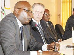 IOC boss Jacque Rogge (C) is flanked by RNOC president Dr.Charles Rudakubana (L) during Thursday's prress conference. The New Times/Timothy Kisambira.