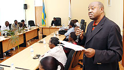  Logan Ndahiro, the acting National Coordinator of DCDP, presenting the achievements during the handover of the final report, yesterday. The New Times /Timothy Kisambira