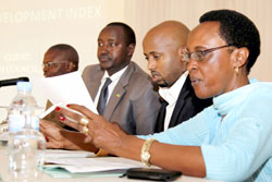  (L-R) MHC executive Secretary Mulama, MHC board chairman Arthur Asiimwe and TI's Immaculee Ingabire at the validation workshop, yesterday. The New Times /Timothy Kisambira