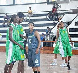 Rwanda's Honore Ayebare (centre in black) reacts to play during the yesterday game against Mali, a game Rwanda lost 59-62. The New Times/Courtsey
