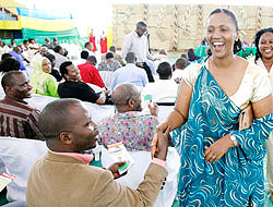 Kigali city candidate Jeanne du2019Arc Gakuba greets her supporters during the senatorial campaign in Kigali City. The New Times /Timothy Kisambira