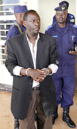  Claudien Niyonizera, the high court judge charged with accepting a bribe is paraded at the Remera police station. The New Times /Timothy Kisambira