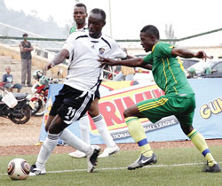Olivier Karekezi (left) made an instant impact on his return to APR, notching a brace as the military side beat Marines 4-0 in a Primus Cup clash yesterday. The New Times/Timothy Kisambira.