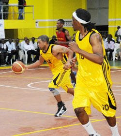 While Hamza Ruhezamihigo (right) scored 11 points in Rwanda's win over Mali, Mathiew Miller (left) has is yet to make a mark in Maputo. The New Times / File.
