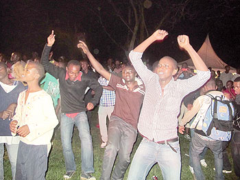 The jovial crowd dances to the tunes of the music. The New Times / L. Mbabazi